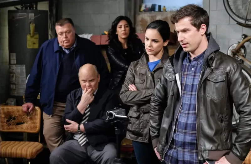 a imagem mostra o elenco da série brooklyn nine nine